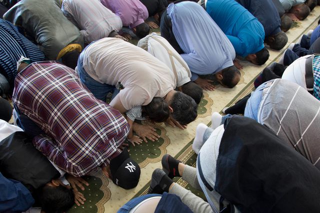 Men pray at Masjid Al-Farooq